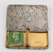 Edward VII hallmarked silver twin stamp case with sliding cover, set with a red cabochon, Birmingham