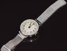 Art Deco platinum and 18ct gold watch set with diamonds, on 9ct white gold strap, 20.9g 22cm