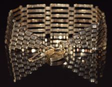 A 9ct gold bracelet with heart padlock clasp, 13.9g and another 9ct gold bracelet (1.5g)