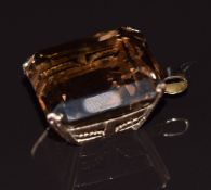 A 9ct gold pendant set with a large smoky quartz, 14.3g