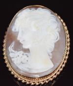 A 9ct gold brooch set with a cameo depicting a young woman