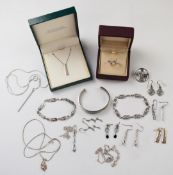 A collection of silver jewellery including ring, necklaces, earrings etc