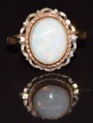 A 9ct gold ring set with an opal, 2.4g, size K