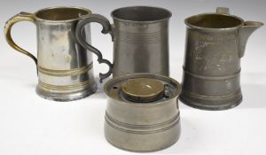 Three large tankards, two marked Quart and one with brewery name to base, together with a