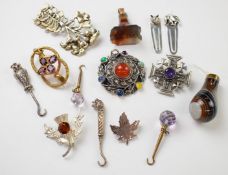 An agate seal and agate pendant, two silver button hooks, two silver book marks and two amethyst