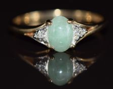 A 9ct gold ring set with jadeite and diamonds, 2g, size P