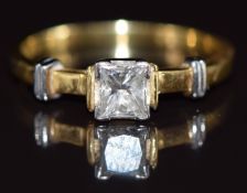 An 18ct gold bi-coloured ring set with a princess cut diamond of approximately 0.5ct, 2.9g, size N