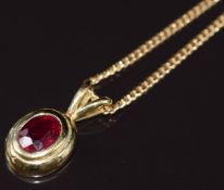 An 18ct gold pendant set with an oval cut ruby of approximately 1.75ct, on 18ct gold chain, 9.3g