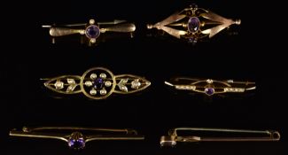 Five Edwardian 9ct gold brooches set with amethysts and seed pearls (8g) and a rolled gold brooch
