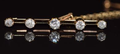 A 9ct gold brooch set with five old cut diamonds, total diamond weight approximately 0.85ct, 3.4g