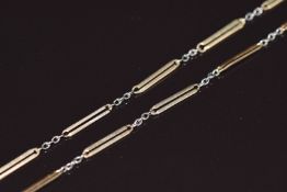 A section of Art Deco 9ct gold bi-coloured chain made up of elongated links, 5.4g