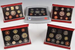 Royal Mint proof coin sets comprising 1998, 1999, 2000, 2001 and 2002, in deluxe cases with