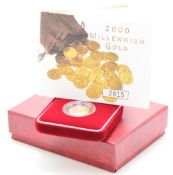 Royal Mint 2000 Queen Elizabeth II Millennium gold half sovereign with certificate no 2815, in