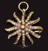 A 14k gold brooch/ pendant set with seed pearls, 3.4g 2.2cm