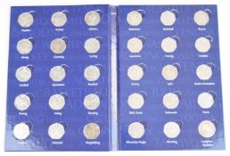 The Lighthouse 50p sports album containing twenty nine Olympic 2011 50p coins, plus the Complete