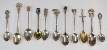 Hallmarked silver and white metal collector's spoons including four 800 or 835 grade examples,