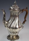 Edward VII hallmarked silver coffee pot with wrythen body in the Georgian style, London 1909,