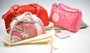 Three Radley bowling themed bags and a matching mirror, all with dust bags, the largest unused