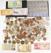 A quantity of overseas and UK coinage and replica Roman coins, some in an album, together with