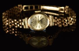 Everite 9ct gold ladies wristwatch with black hands, two-tone hour markers, silver dial and 17 jewel
