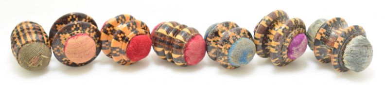 Sewing, needlework and embroidery interest seven Mauchline ware double ended pin cushions