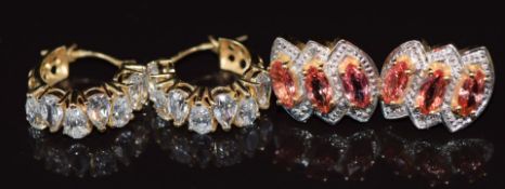 A pair of 18ct gold earrings set with Padparadscha sapphires (5.2g) and a pair of 14k gold
