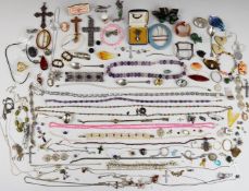 A collection of jewellery including silver and Danish silver brooches, silver pendants and chains,