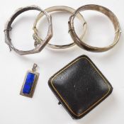 Three silver bangles, silver pendant set with lapis and vintage box