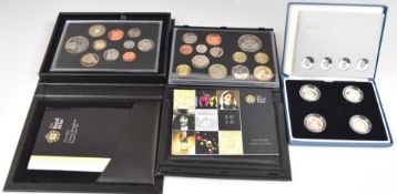 Royal Mint 2004 silver pattern £1 coin set, together with 2010 and 2012 UK proof coin sets