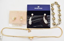 A pair of Christian Dior earrings and necklace, Swarovski earrings, and silver bracelet