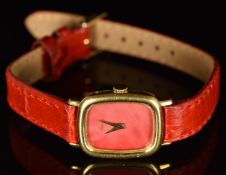 Asprey 18ct gold ladies wristwatch with gold hands, red dial and mechanical movement, on red leather