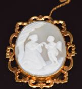 Victorian yellow metal brooch set with a cameo depicting a woman with a cherub/ putti