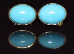 A pair of 9ct gold earrings each set with a turquoise cabochon, 1.5g 0.8x0.6cm