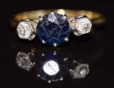 A 18ct gold ring set with a sapphire and diamonds, 2.1g, size J