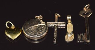 Six 9ct gold pendants including chick, heart, cross, key, locket and flip flop, 7.3g