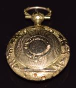 Victorian 9ct gold locket with embossed shamrock decoration and engine turned decoration, 4g