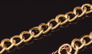 A 9ct gold curb link bracelet with engraved links and heart padlock clasp, c1900, 12.2g