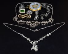 A 9ct gold brooch (2g), two silver brooches and a silver and marcasite brooch, three pairs of