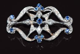 A c1950 18ct white gold brooch set with diamonds and sapphires, 11.2g, 4.5 x 2.5x4.5cm