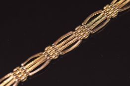 A 9ct rose gold gate bracelet with heart clasp, 7.9g