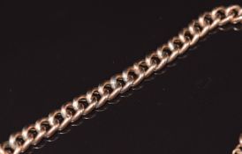A 9ct rose gold curb link bracelet with heart padlock clasp, 10.1g