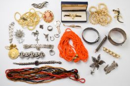 A collection of silver jewellery including two bangles, marcasite bracelet, silver gilt pendant,