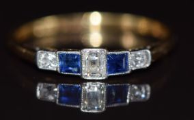 Art Deco 18ct gold ring set with an emerald cut diamond, two calibre cut sapphires and two old cut