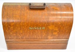 Vintage Singer hand operated sewing machine, in wooden case, together with a quantity of accessory