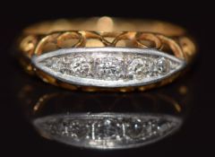 An 18ct gold ring set with five diamonds, Chester 1915, 2.4g, size J