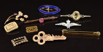 A 9ct gold brooch, silver brooch, Victorian mourning brooch set with seed pearls, enamel scarf clip,