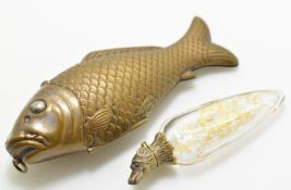 19thC gilt metal and glass fox head scent bottle with floral gilt decoration, in brass fish case