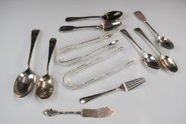 Georgian and later hallmarked silver cutlery including bright cut sugar nips, further fiddle pattern