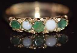 A 9ct gold ring set with emeralds and opals, 2g, size M