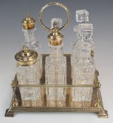 Victorian hallmarked silver six bottle cruet, with cut glass bottles and four column supports,